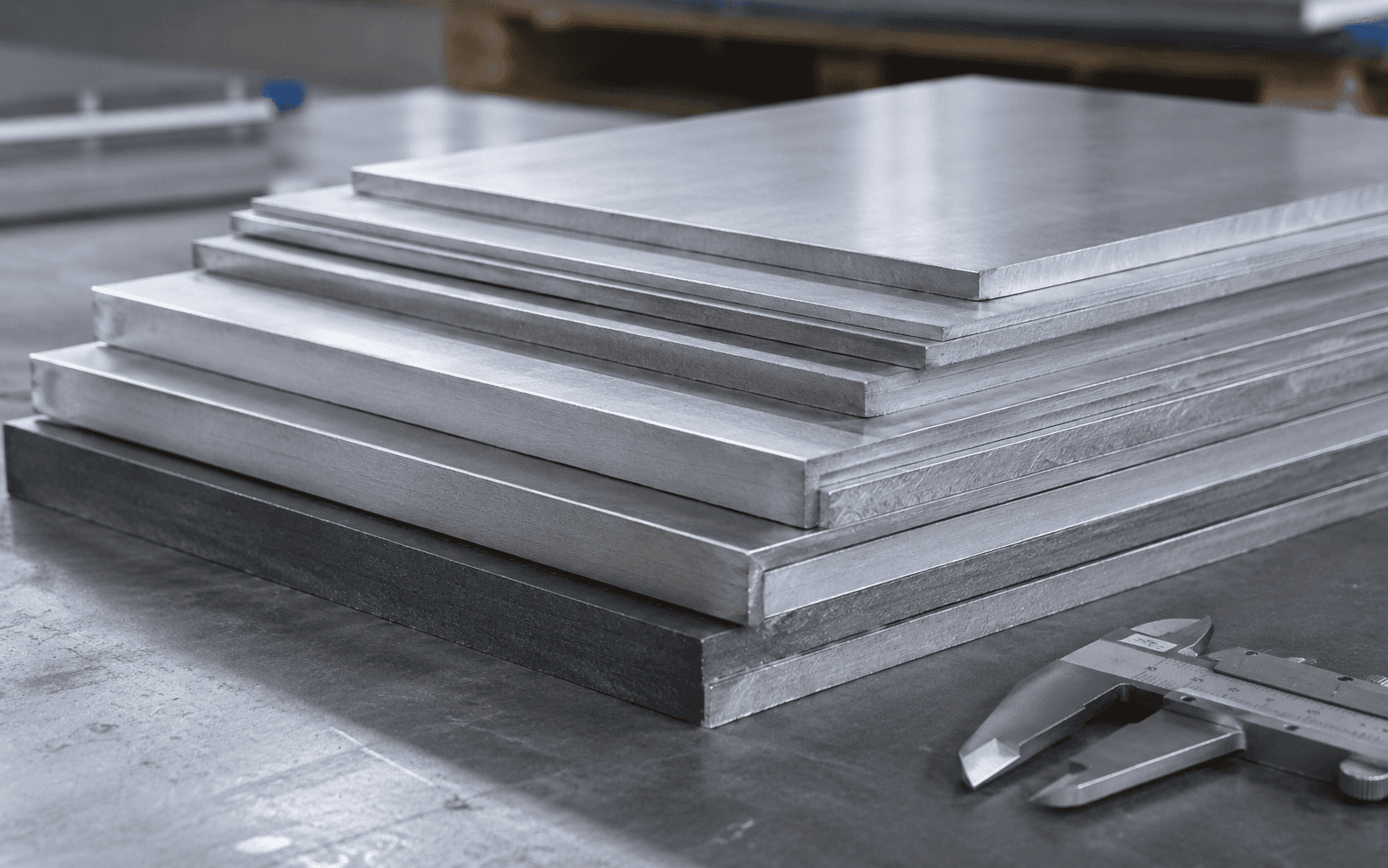 Layered stainless steel plate sheets for tanks and industrial vessels
